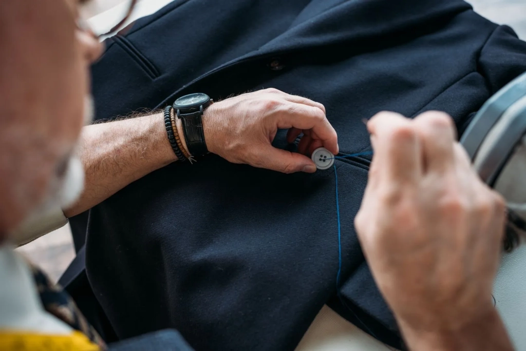 cropped-image-of-tailor-sewing-button-to-jacket-at-2024-11-17-10-06-14-utc_result