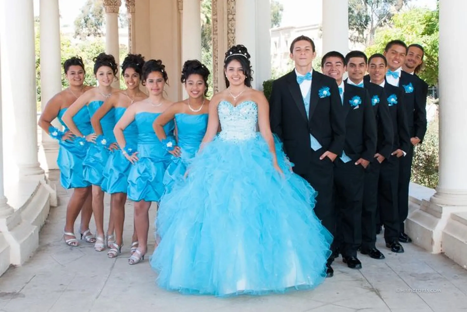 Quinceañeras party with boys and girls in formal dress